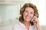 Senior woman talking on telephone