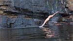 Man diving into lake