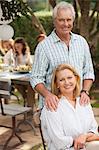 Senior couple smiling outdoors