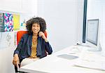 Portrait of smiling businesswoman in office