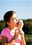 Girl eating Ice Cream Cone, Lampertheim, Hesse, Germany