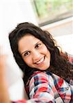 Teenage girl smiling and posing, taking selfie with smart phone, Germany