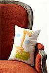 Close-up of Handmade Painted Pillow on chair, studio shot