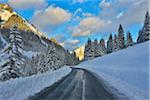 Road in Winter with Snow Covered Mountains, Berwang, Alps, Tyrol, Austria