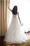 Portrait of Bride Standing by Window, Toronto, Ontario, Canada