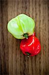Sweet peppers on wooden table