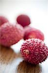 Leeche fruits on wooden table