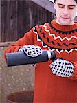 Man pouring coffee from thermos