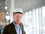 Portrait of smiling architect on building site