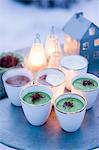 Close-up of soup in cups