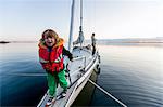 Happy boy on sailing boat