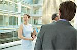 Business people standing in office