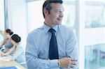 Businessman smiling in office