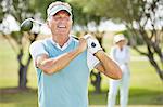 Senior couple on golf course