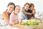 Family sitting together at table