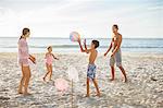 Family playing on beach