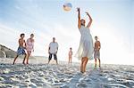 Family playing together on beach