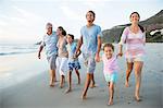 Family walking together on beach