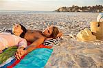 Couple relaxing together on beach