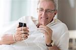 Older man using cell phone