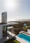 Modern house and lap pool overlooking ocean