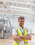 Worker smiling in factory