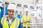 Workers smiling in factory