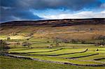 Clouds over rural hills