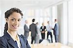 Businesswoman smiling in meeting