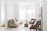 Sofa and armchairs in living room