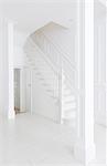 Staircase in white foyer