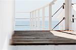 Wooden balcony overlooking ocean