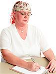 Woman undergoing chemotherapy for cancer is back at work.  White background.