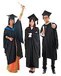 Full body group of multi races university student in graduation gown standing isolated on white background