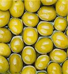 Green olives texture food background