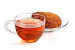 Glass cup of black tea with homemade cookies. Isolated on white background