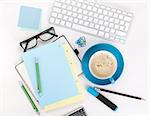 Coffee and office supplies. View from above. On white background