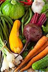 Fresh ripe vegetables on a wooden board.