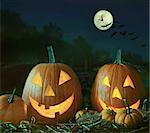 Night scene with Halloween pumpkins and moon