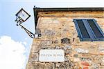 Monteriggioni, Tuscany, Italy. Street plate of the main square of the town.