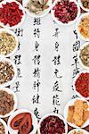 Traditional chinese herbal medicine with mandarin script calligraphy on rice paper. Translation describes the functions to increase the bodys ability to maintain body and spirit health and to balance energy.