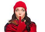 Funny Faced Wide Eyed Mixed Race Woman Wearing Winter Hat and Gloves Isolated on White Background.