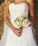 European bride holding beautiful wedding  bouquet.