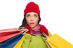 Beautiful Mixed Race Woman Wearing Winter Hat and Gloves Isolated on a White Background.