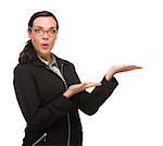 Confident Mixed Race Businesswoman Gesturing with Hand to the Side Isolated on a White Background.