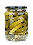Pickles in glass jar. Isolated on white background