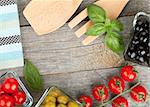 Fruits, vegetables and utensils on wooden table