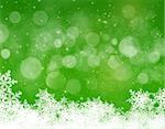 Abstract green and white christmas background with snowflakes