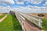 blue sky and long white bridge over river, Alkmaar, North Holland