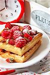 Delicious Belgian waffle with fresh berries for breakfast.
